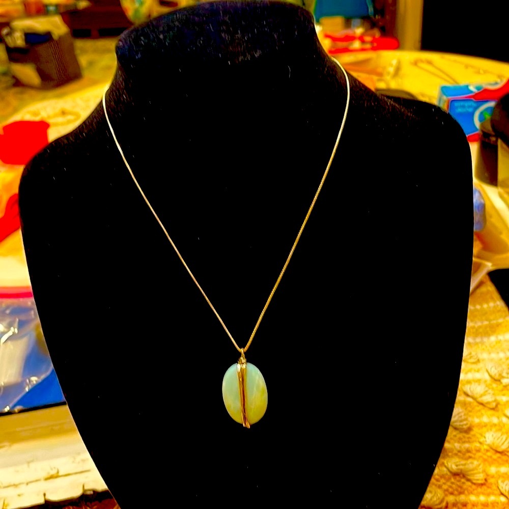 Silpada Sterling Silver and a light blue stone.